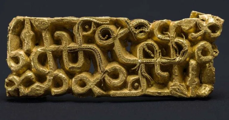 The richly decorated gold sword scabbard ornament, dating back 1,500 years, discovered in southwestern Norway. Credit: Annette Græsli Øvrelid / Museum of Archaeology / University of Stavanger.
