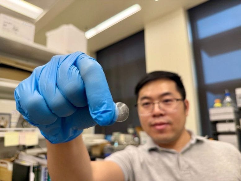 Penghui Zhao Holds Up the iNal Patch