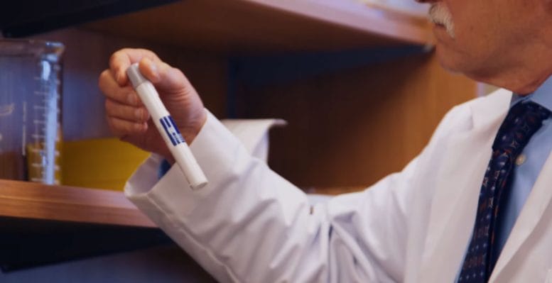 Steven Heymsfield Examining Tube