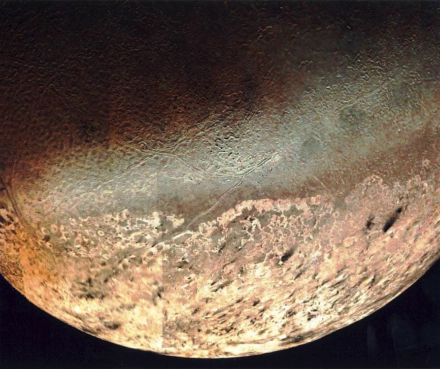 Neptune's largest Moon, Triton, shows similar nitrogen ice activity through its surface markings and nitrogen glaciers.Credit: NASA/JPL