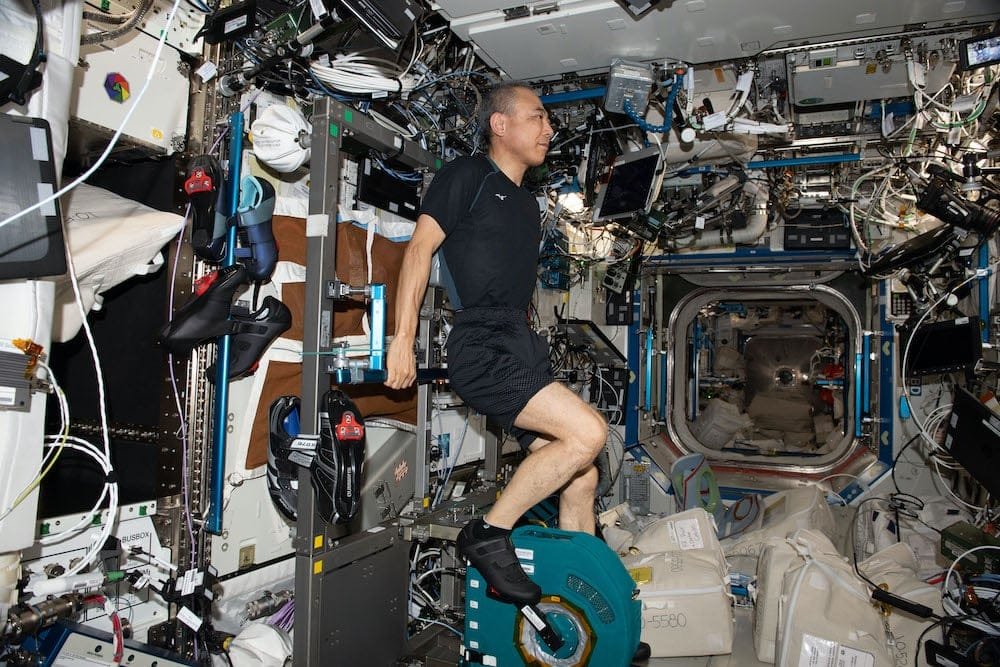 JAXA (Japan Aerospace Exploration Agency) astronaut Satoshi Furukawa pedals on the upgraded CEVIS system, keeping muscle and bone density levels during spaceflight. (Credit: NASA)
