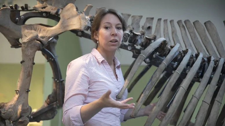 Erika Rosengren Beside Aurochs Skeleton