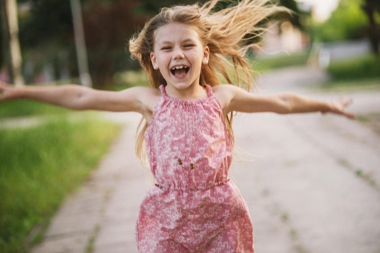 Happy Exciting Girl Running Outside