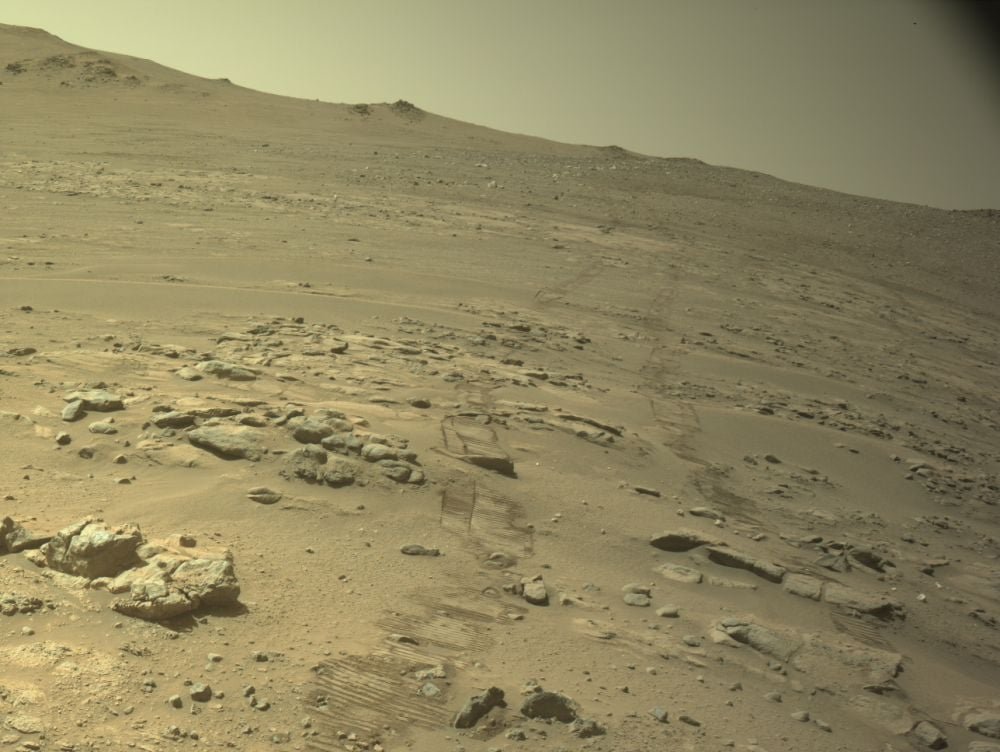Perseverance captured this backward-looking image on the day it set its new distance-travelled record. The date was Oct. 11th 2026, or on the 2006th Martian sol of its mission. Image Credit: NASA/JPL-Caltech