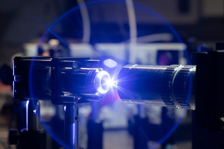 Ultrafast Laser Beam in Magnetic Switching Experiment