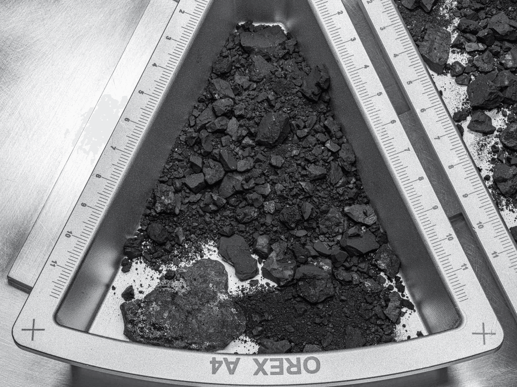 The half a gram of Bennu material that was sent to ETH Zurich. Credit - Erika Blumenfeld & Joseph Aebersold / NASA